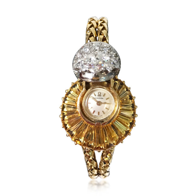 Montre Omega à secret topaze et diamants, circa 1956 Montre Omega à secret topaze et diamants, circa 1956