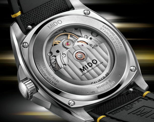 Mido Multifort TV Big Date : cadran fumé et touches de jaune vif