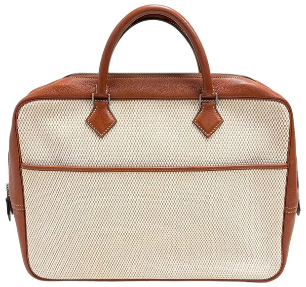 Le sac Plume d'Hermès : le luxe silencieux des hommes qui voyagent léger Le sac Plume d'Hermès : le luxe silencieux des hommes qui voyagent léger