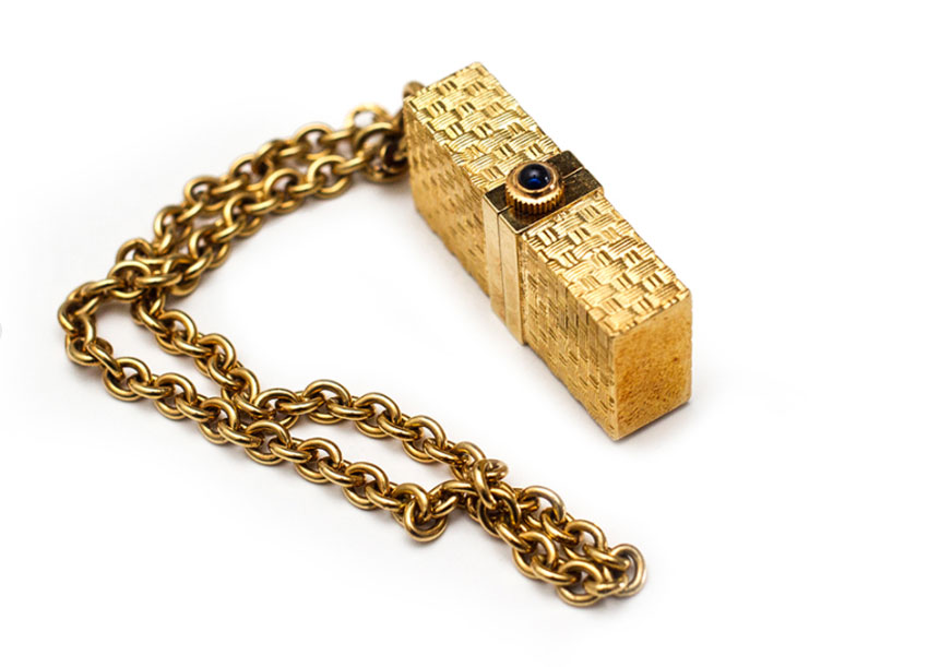 Montre de sac en or jaune de chez Corum, années 60