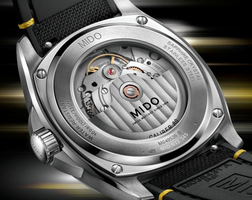 Mido Multifort TV Big Date : cadran fumé et touches de jaune vif