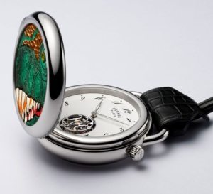Hermès : une Arceau montre de poche à l'effigie du T-Rex en marqueterie de cuir